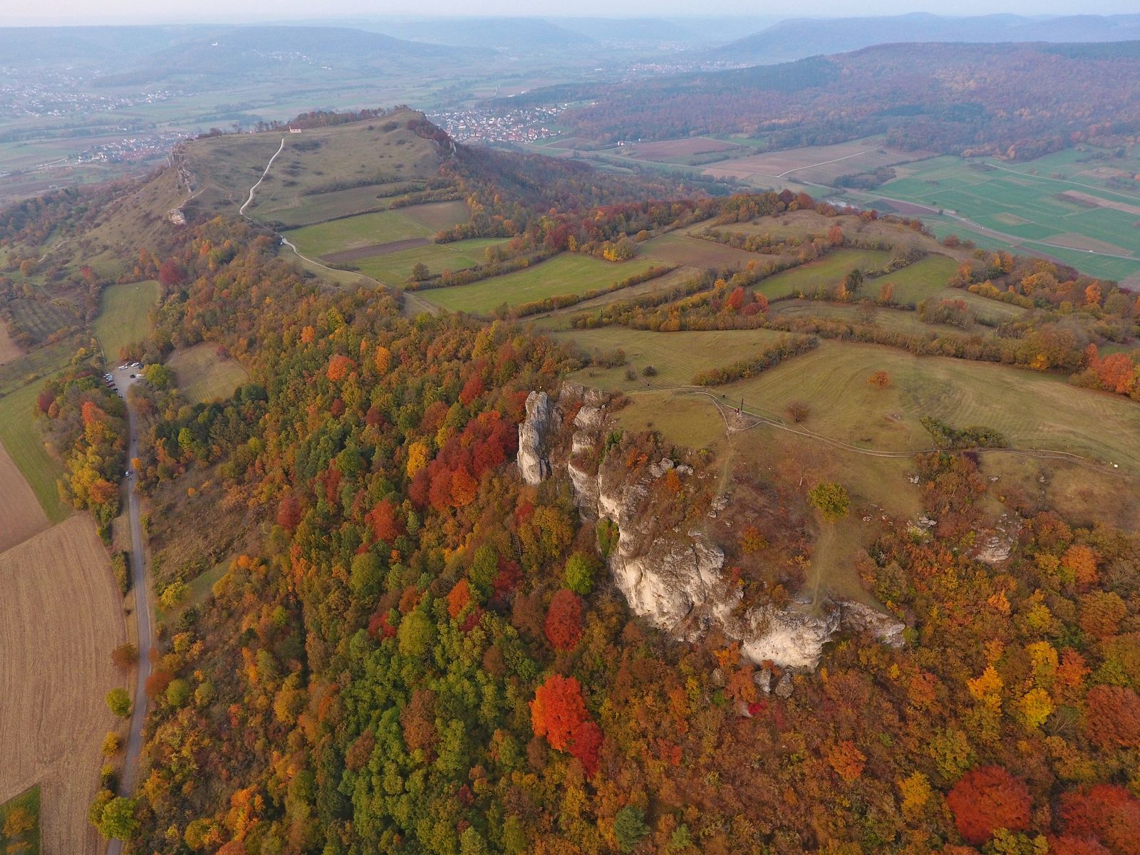 Walberla with its band of rock in autumn, from the air